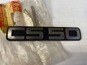 SUZUKI CS50 ROADIE SIDE PANEL EMBLEM (BADGE) NOS 68131-02130